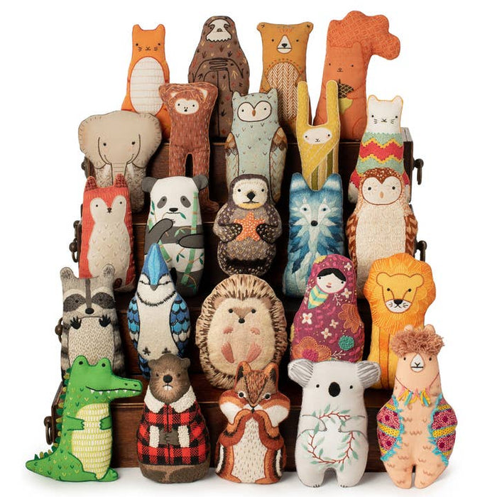 Collection of completed Kiriki embroidered dolls