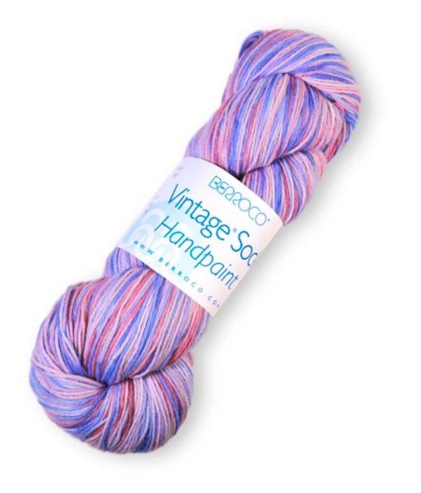 Multicolored skein of yarn with a label on a white background