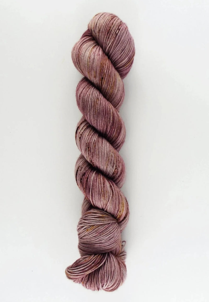 Skein of multicolored yarn on a white background
