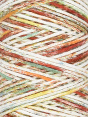 Close-up of multicolored yarn with shades of orange, green, and white.
