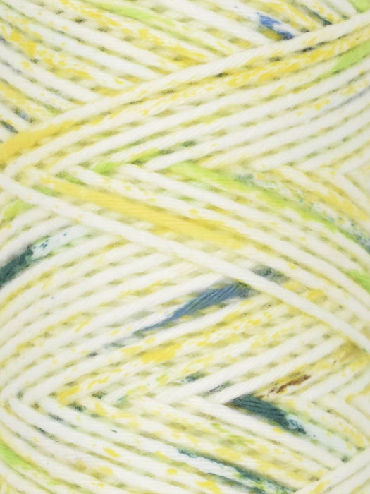 Close-up of multicolored yarn with yellow, green, and blue hues.