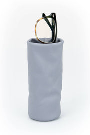 Gray eyeglass case with a pair of glasses on a white background