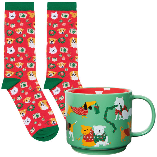 Set of Christmas-themed socks and mug with dog illustrations on a white background
