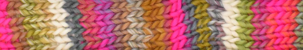 Colorful yarn swatch with a gradient of pink, green, and gray.
