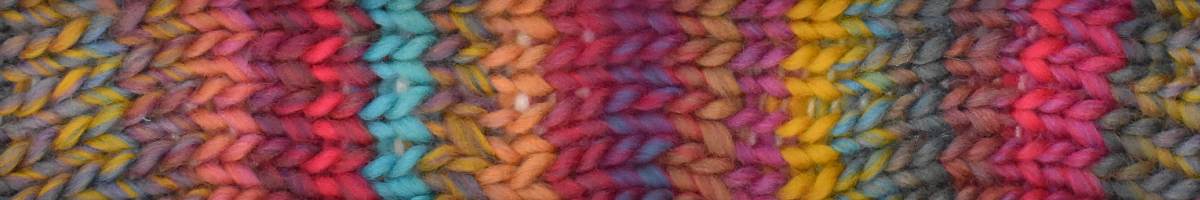 Color swatch with a pattern of purple, red, and green shades.