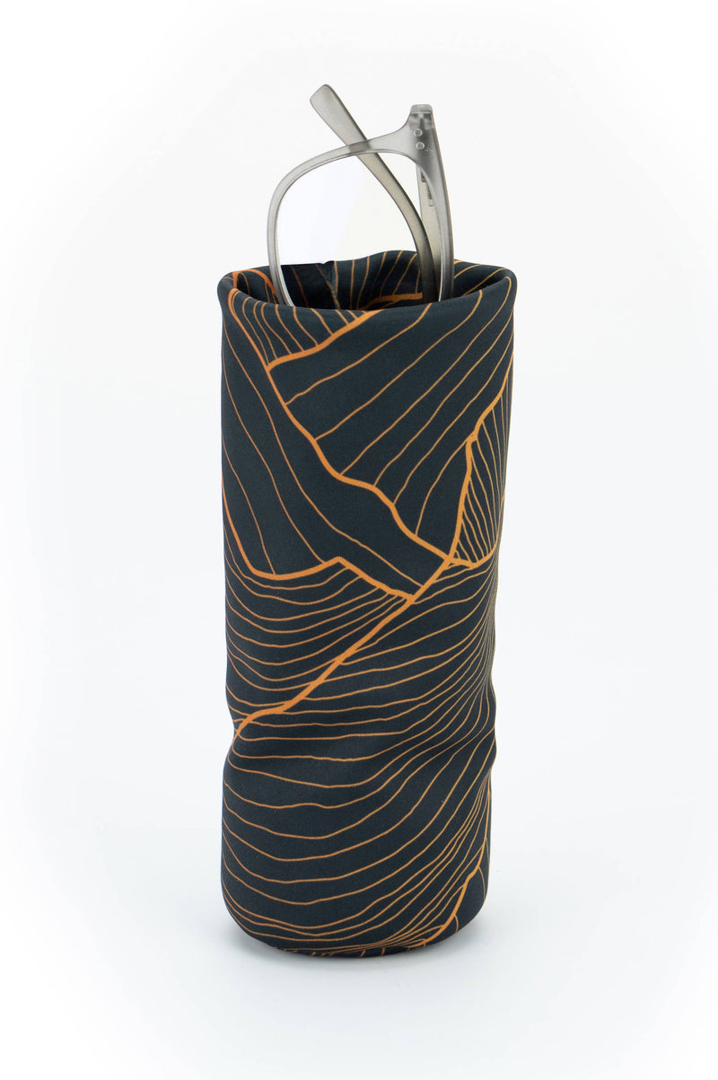 Black and orange patterned umbrella on a white background
