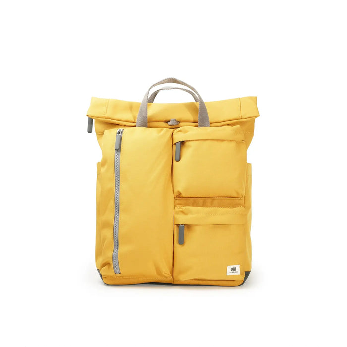 Yellow backpack with gray zippers on a white background