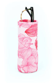 Floral-patterned sunglasses case with sunglasses inside on a white background