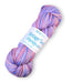 Multicolored skein of yarn with a label on a white background