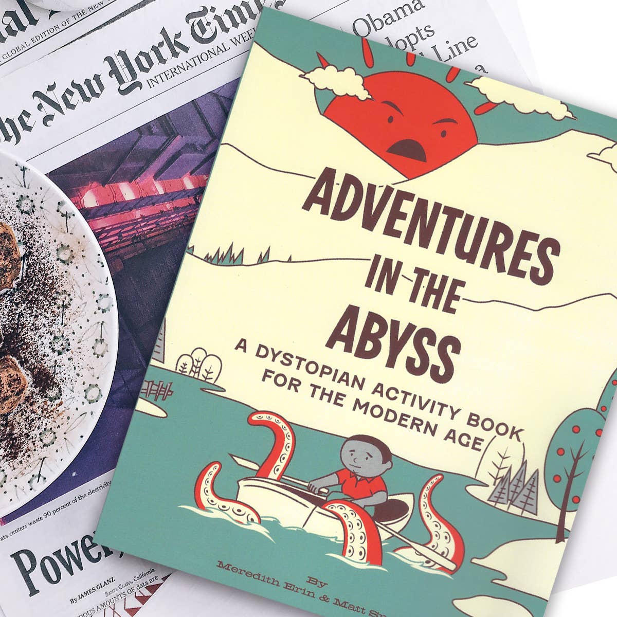 Book titled 'Adventures in the Abyss' on a newspaper background