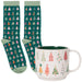 Pair of socks with Christmas tree pattern and a matching mug on a white background