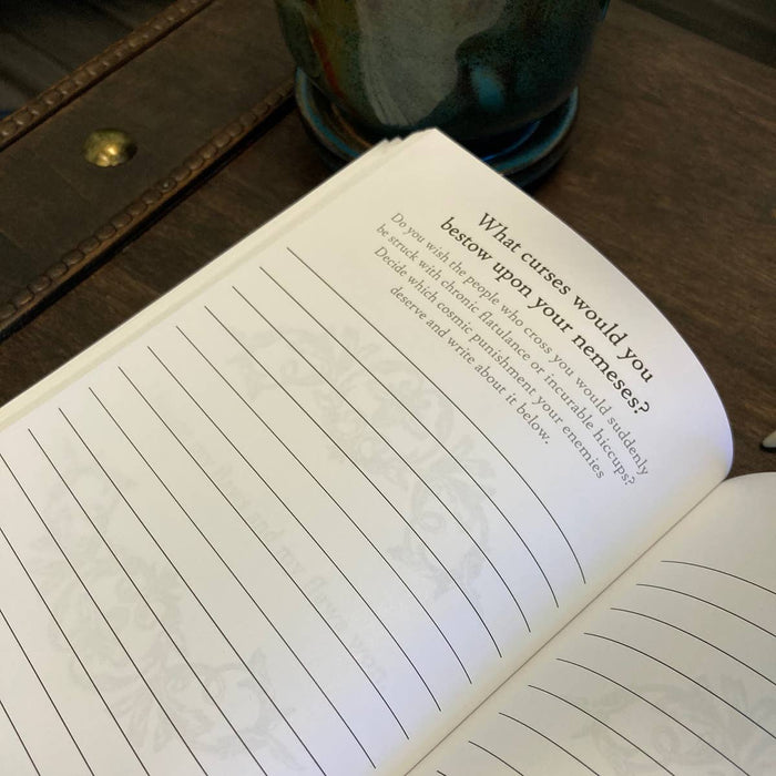 Open notebook with text on a wooden surface