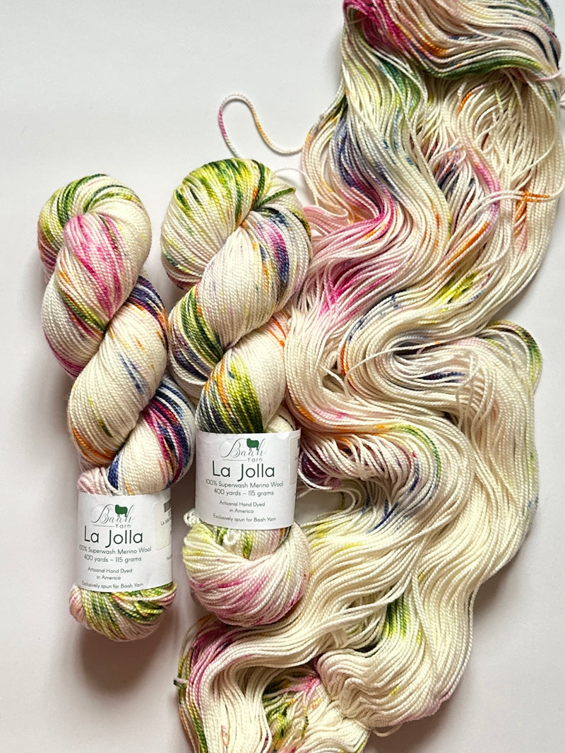 Multicolored yarn skeins with a La Jolla label on a light background