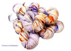 Multicolored yarn skeins on a white background
