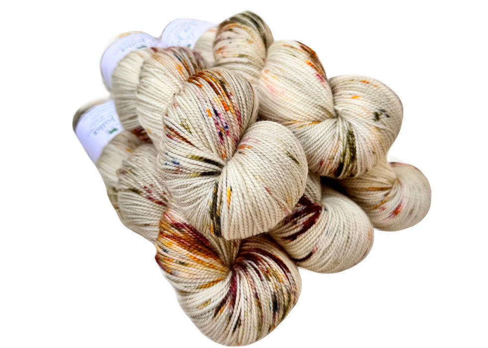  skein of multicolored yarn on a white background