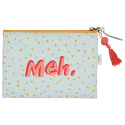 Pouch with 'Meh.' text and polka dot pattern on a light blue background