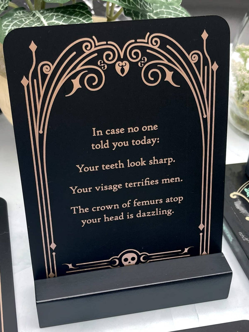 Decorative sign with text on a stand